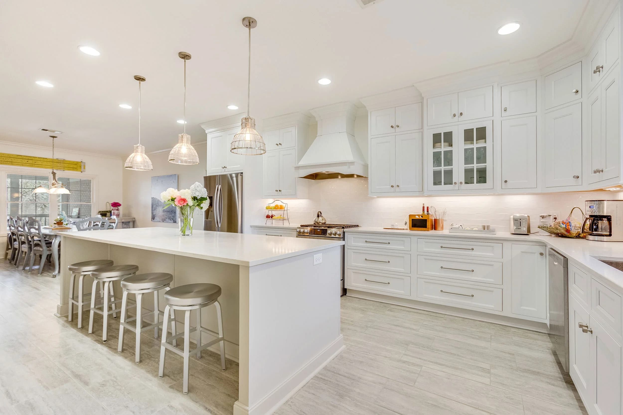 Modern kitchen with white cabinets and island